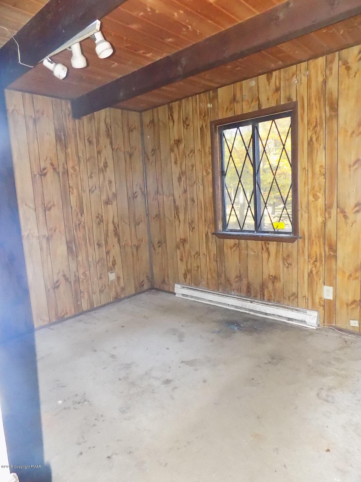521 Gold Finch Road Bushkill, PA 18324 - Photo 8 of 14 a view of an empty room with a window
