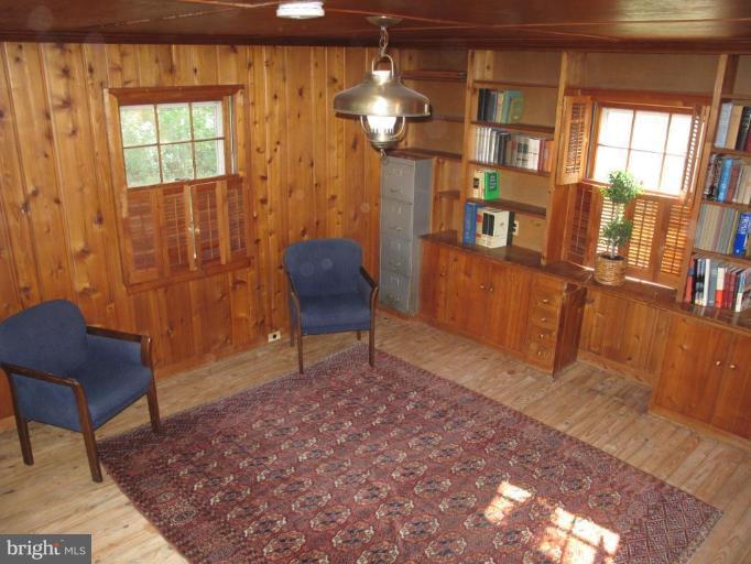 9508 Wire Avenue Silver Spring, MD 20901 - Photo 2 of 10 a view of a livingroom with furniture and a window