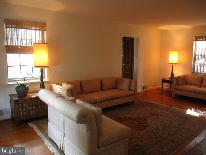 9508 Wire Avenue Silver Spring, MD 20901 - Photo 4 of 10 a living room with furniture and a window