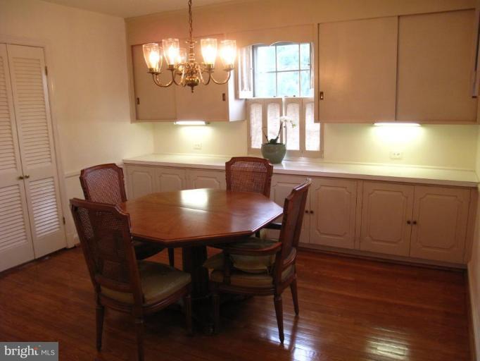 9508 Wire Avenue Silver Spring, MD 20901 - Photo 7 of 10 a view of a dining room with furniture and window