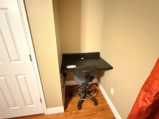 a view of entryway with wooden floor