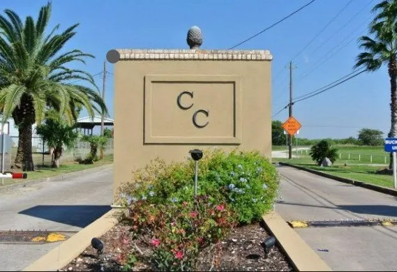 a view of a kitchen with a sink and a potted plants