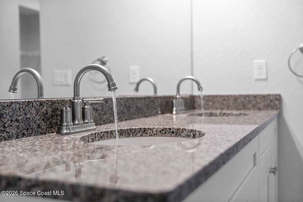 533 Fellenz Street Palm Bay, FL 32908 - Photo 27 of 42 27. Primary Bathroom Sinks Detail