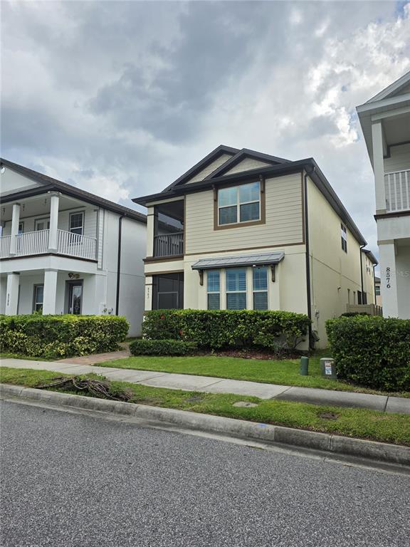 8582 Powder Ridge Trail Windermere, FL 34786 - Photo 50 of 50 a front view of a house with a yard