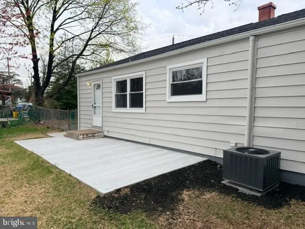 a view of a backyard with a tub