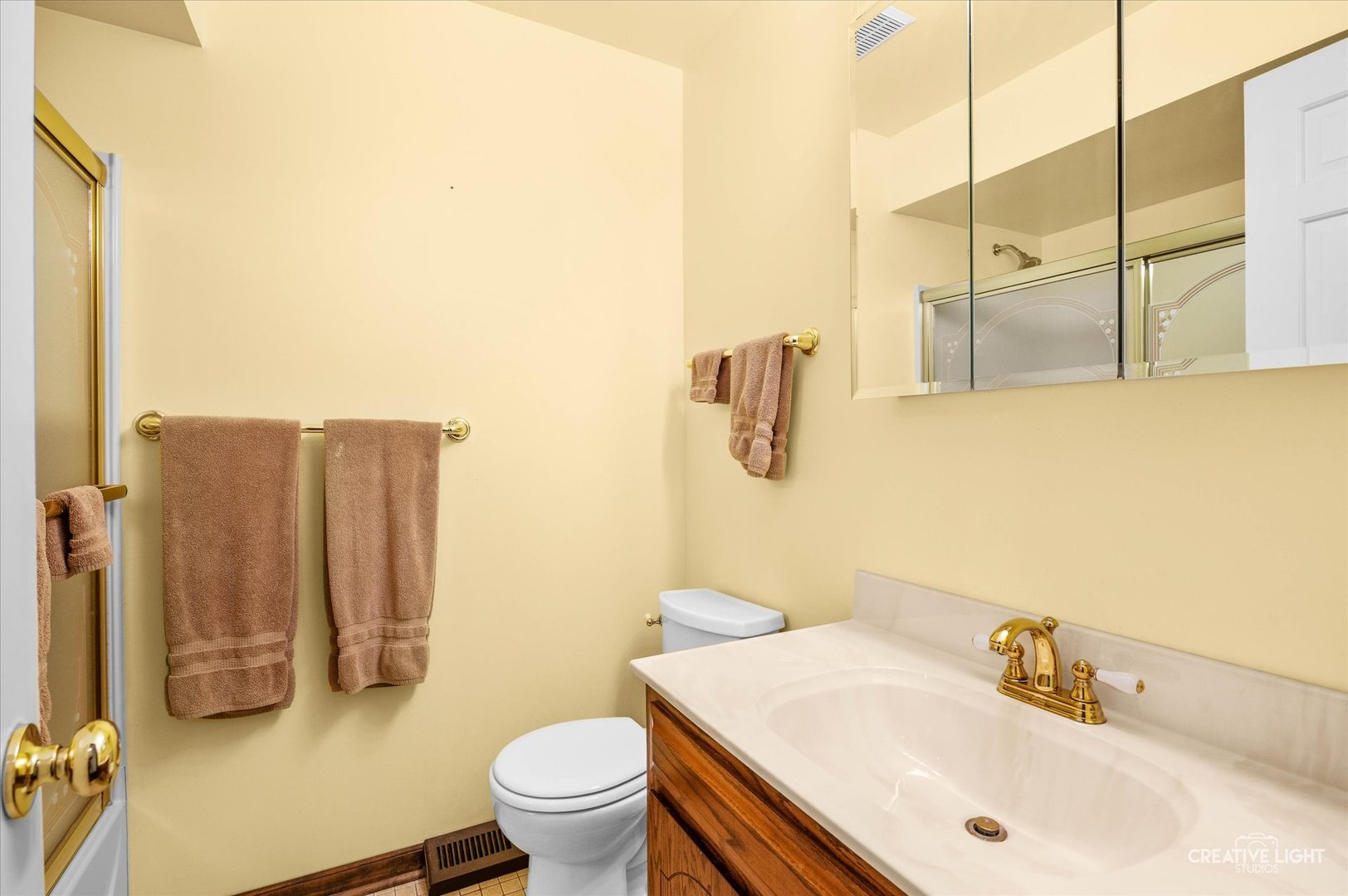 15304 South Indian Boundary Line Road Plainfield, IL 60544 - Photo 13 of 28 a bathroom with a sink and toilet