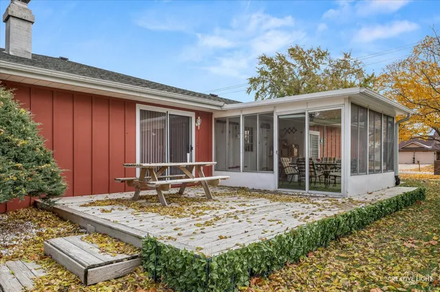front view of a house with a garden