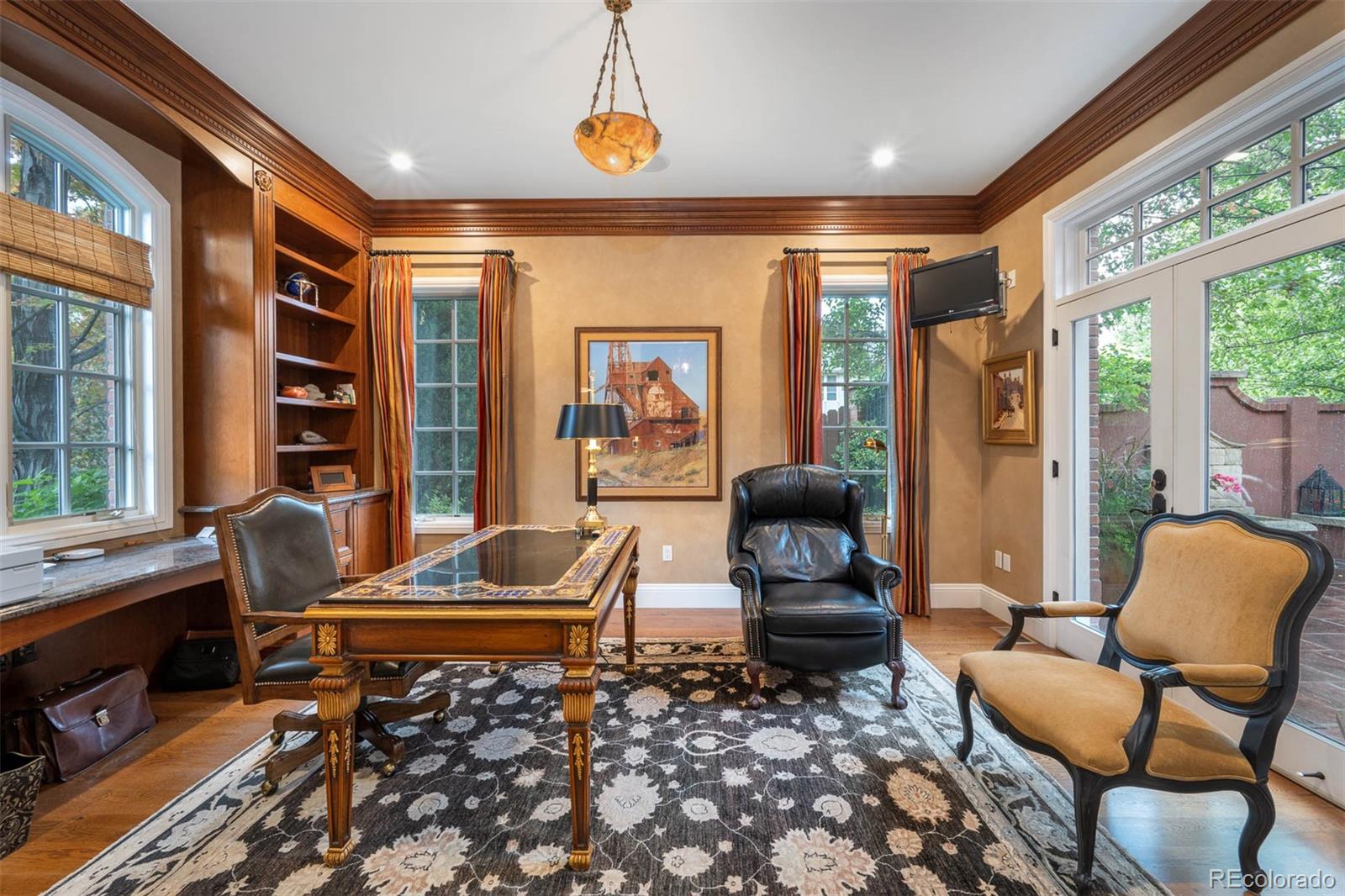 445 Madison Street Denver, CO 80206 - Photo 6 of 50 a living room with furniture and a large window