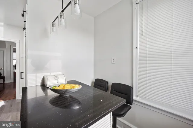 a view of a workspace with furniture