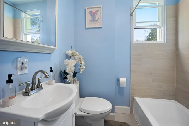 a bathroom with a sink and a toilet