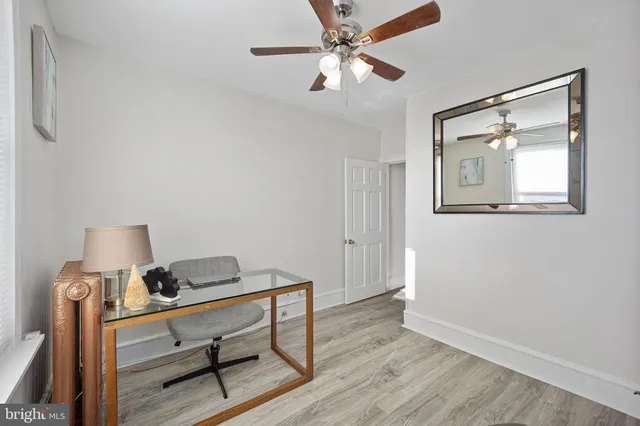 a view of workspace with wooden floor outdoor view