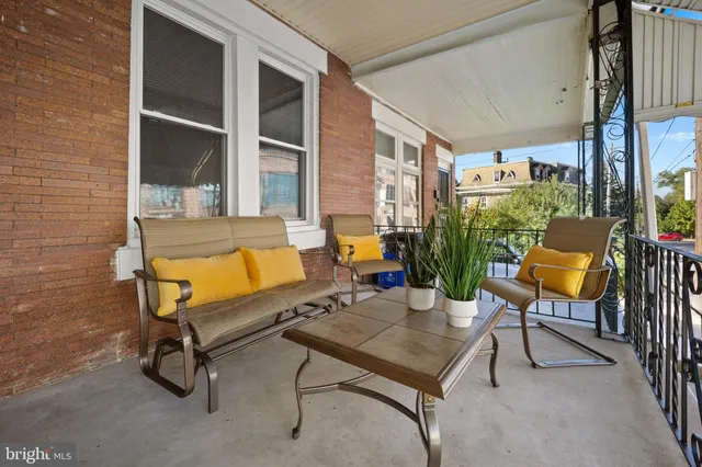 a building outdoor space with patio furniture