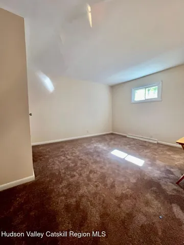 an empty room with a workbench