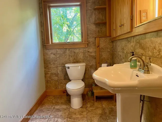 a bathroom with a sink and a toilet