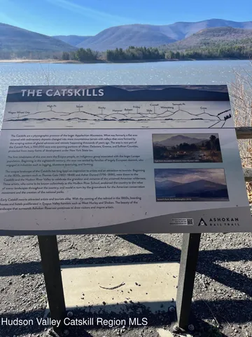a view of an ocean and mountain