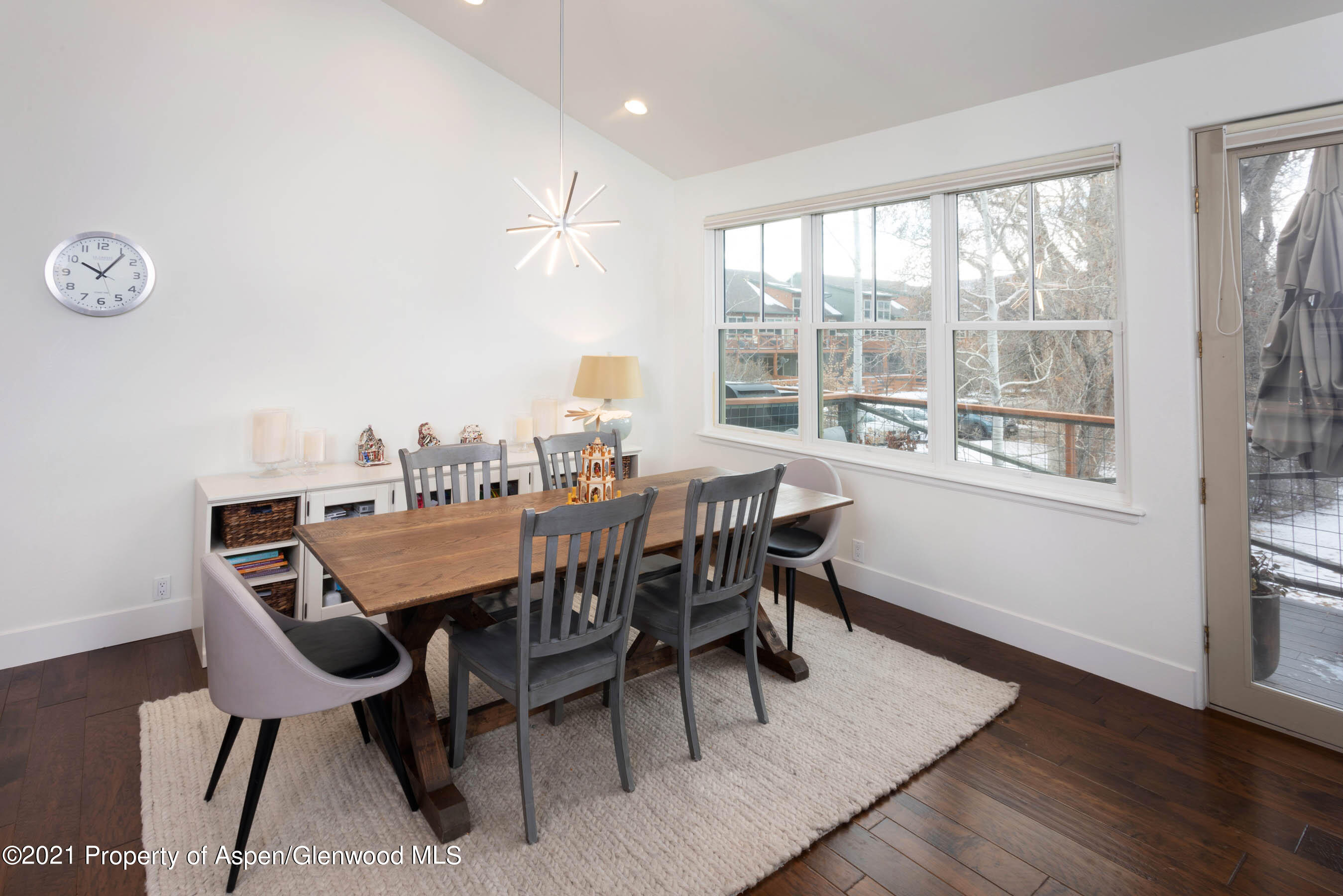 614 Evans Court Basalt, CO 81621 - Photo 12 of 34 a dining room with furniture and wooden floor