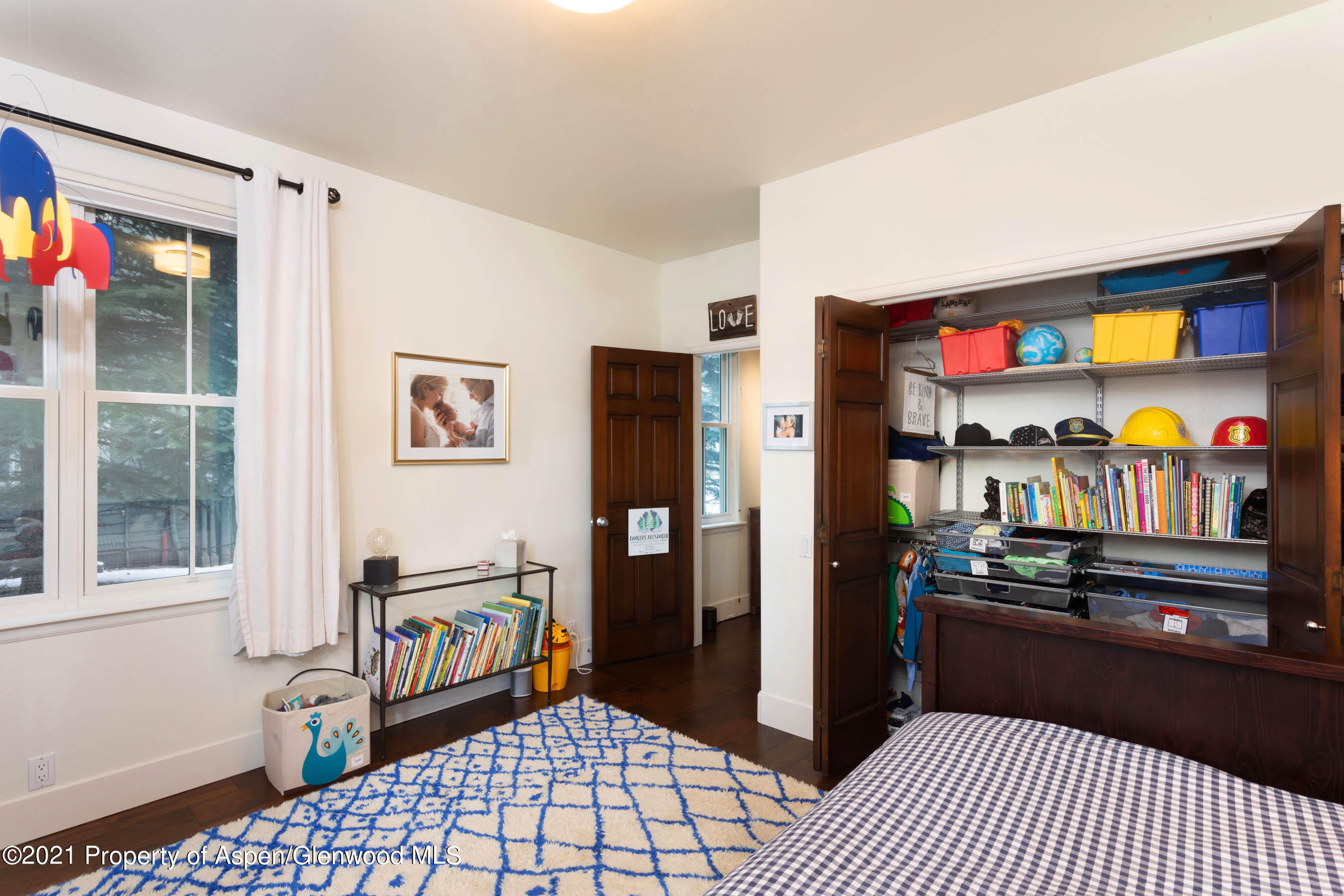 614 Evans Court Basalt, CO 81621 - Photo 29 of 34 a kitchen with stainless steel appliances kitchen island granite countertop a refrigerator and a stove