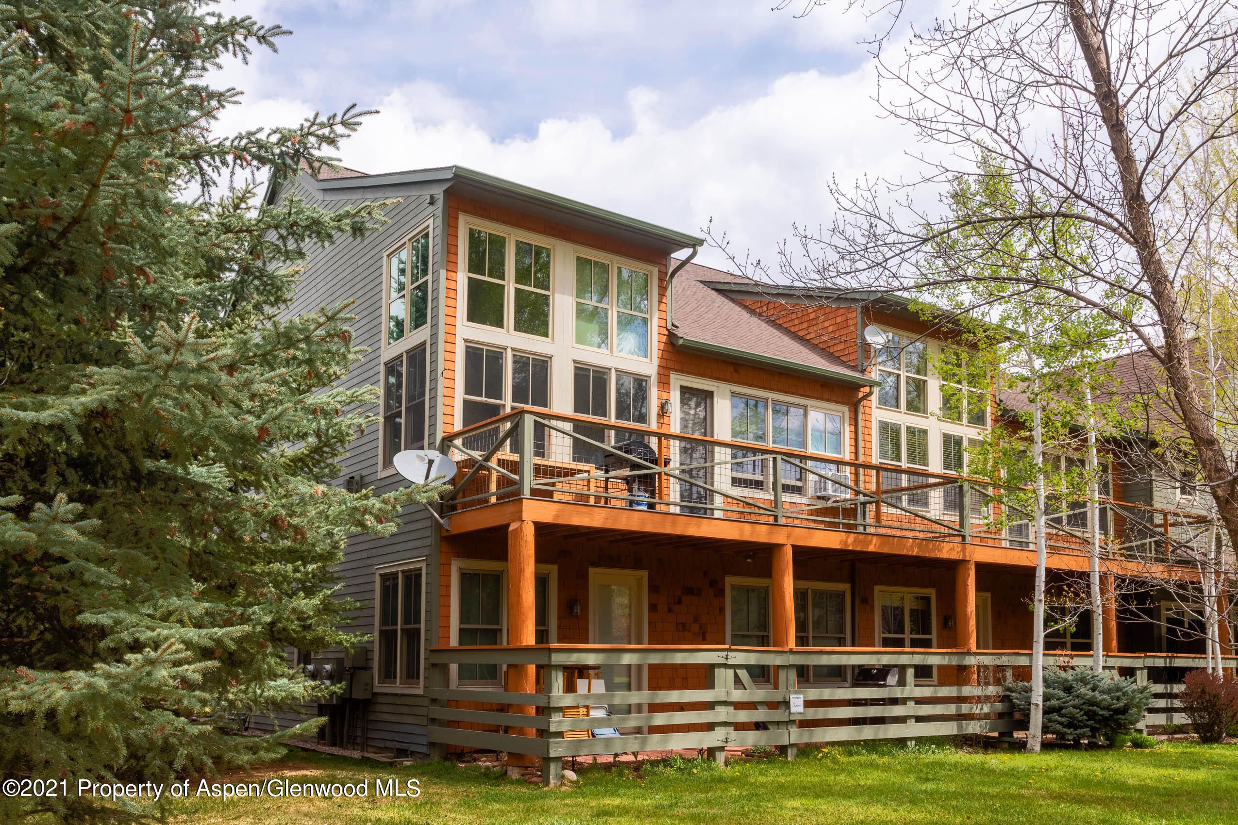 614 Evans Court Basalt, CO 81621 - Photo 3 of 34 a view of a brick building next to a yard