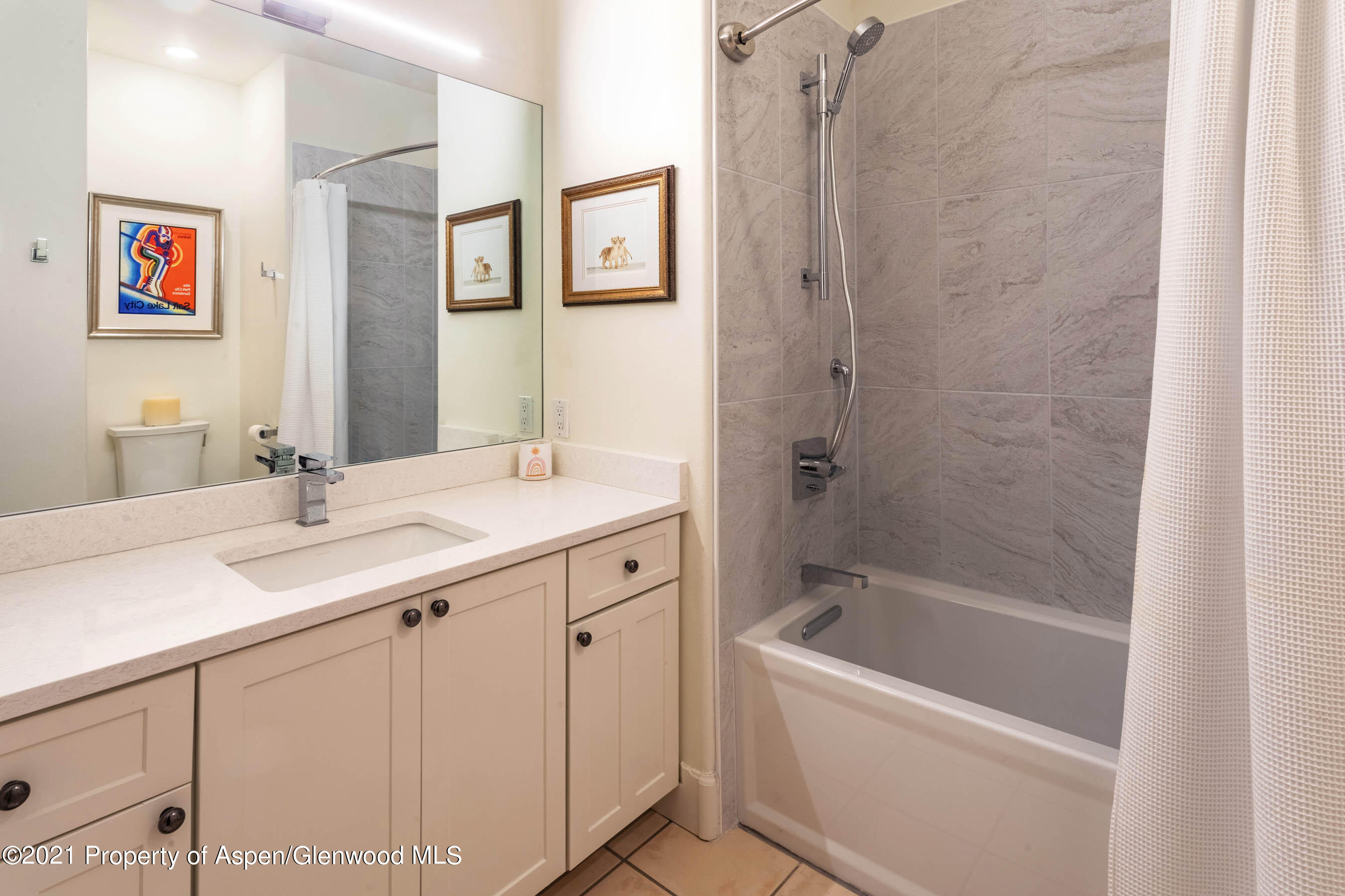 614 Evans Court Basalt, CO 81621 - Photo 31 of 34 a bathroom with a bathtub and a sink