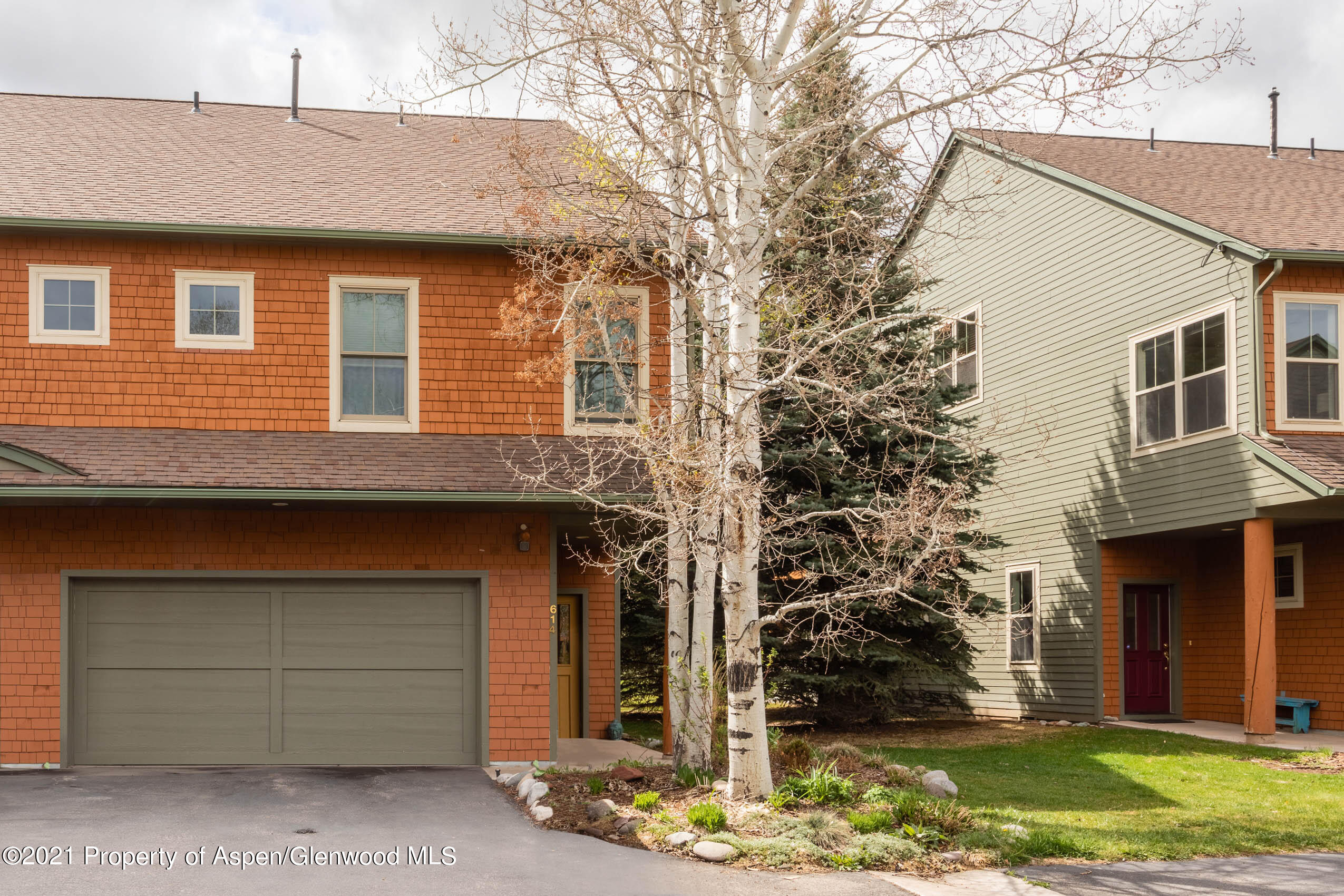 614 Evans Court Basalt, CO 81621 - Photo 32 of 34 a front view of a house with a yard
