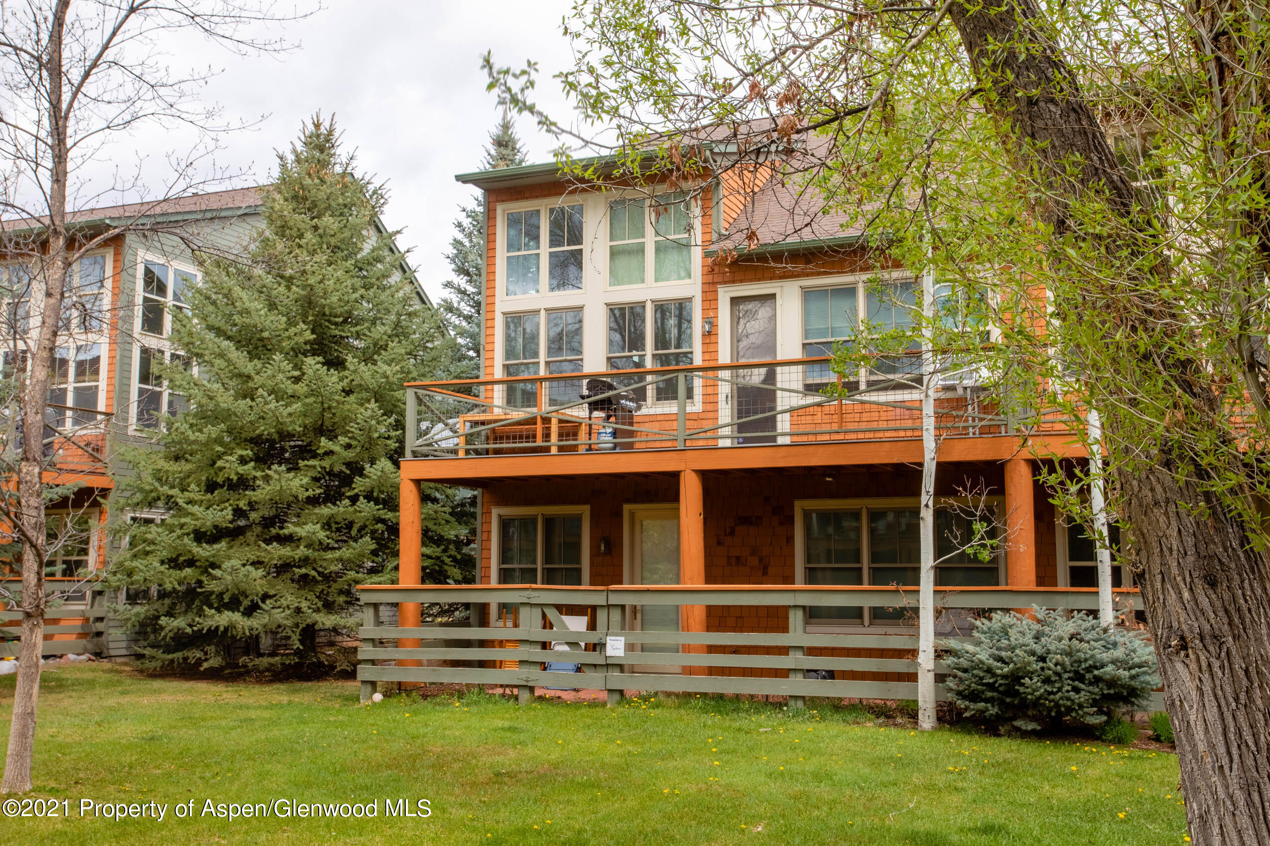 614 Evans Court Basalt, CO 81621 - Photo 4 of 34 a front view of a house with a yard