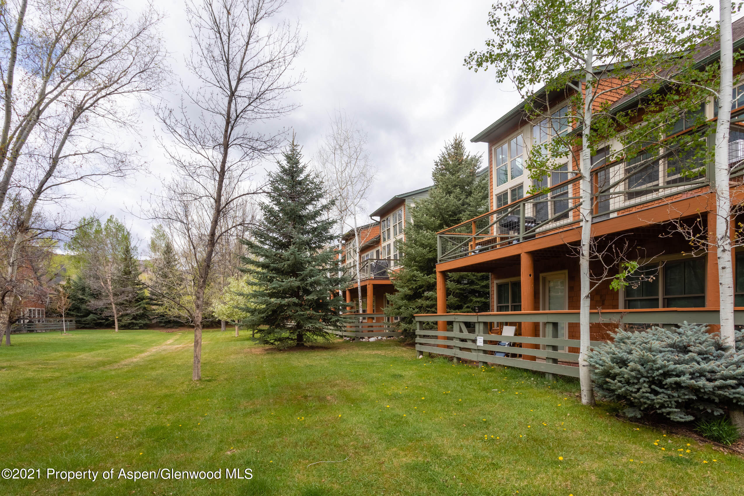 614 Evans Court Basalt, CO 81621 - Photo 5 of 34 a view of a house with backyard and garden