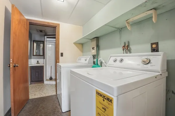 a utility room with washer and dryer