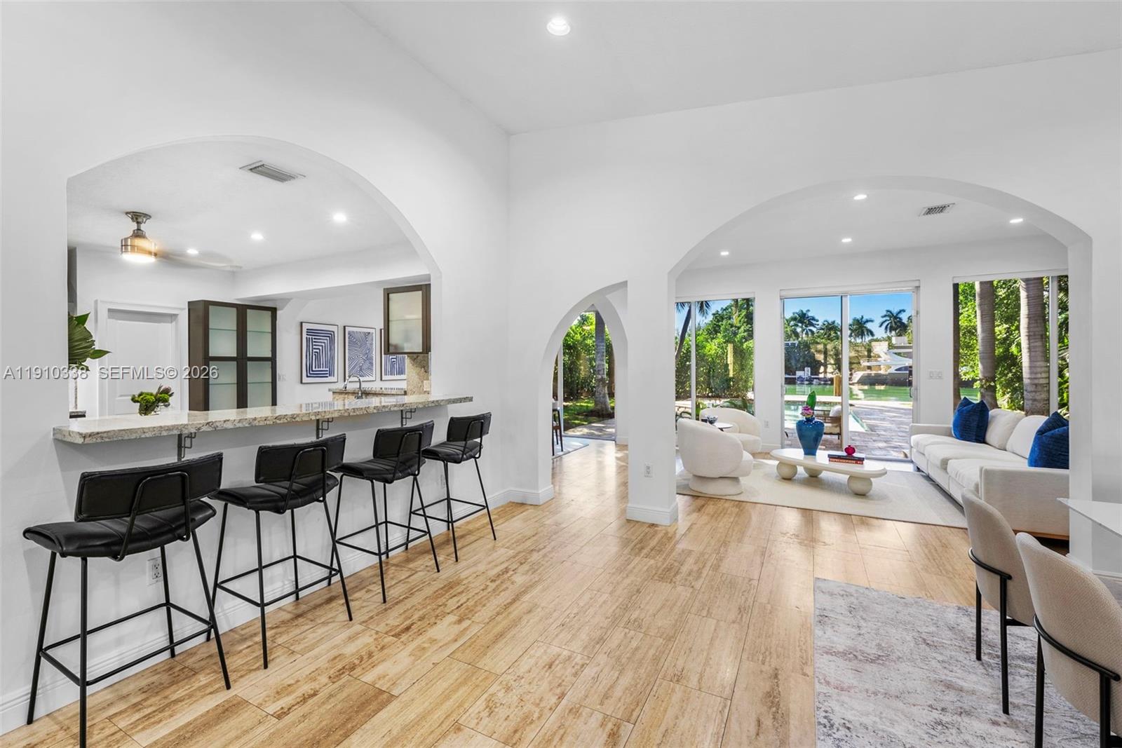 6300 Allison Road Miami Beach, FL 33141 - Photo 13 of 43 a living room with furniture and a wooden floor