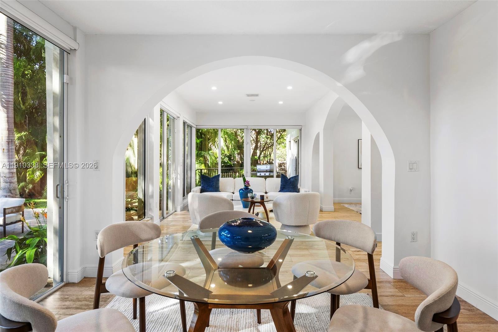6300 Allison Road Miami Beach, FL 33141 - Photo 15 of 43 a view of a dining room with furniture window and outside view