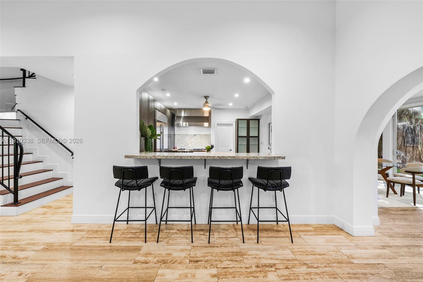 6300 Allison Road Miami Beach, FL 33141 - Photo 20 of 43 a view of entryway and hall with wooden floor