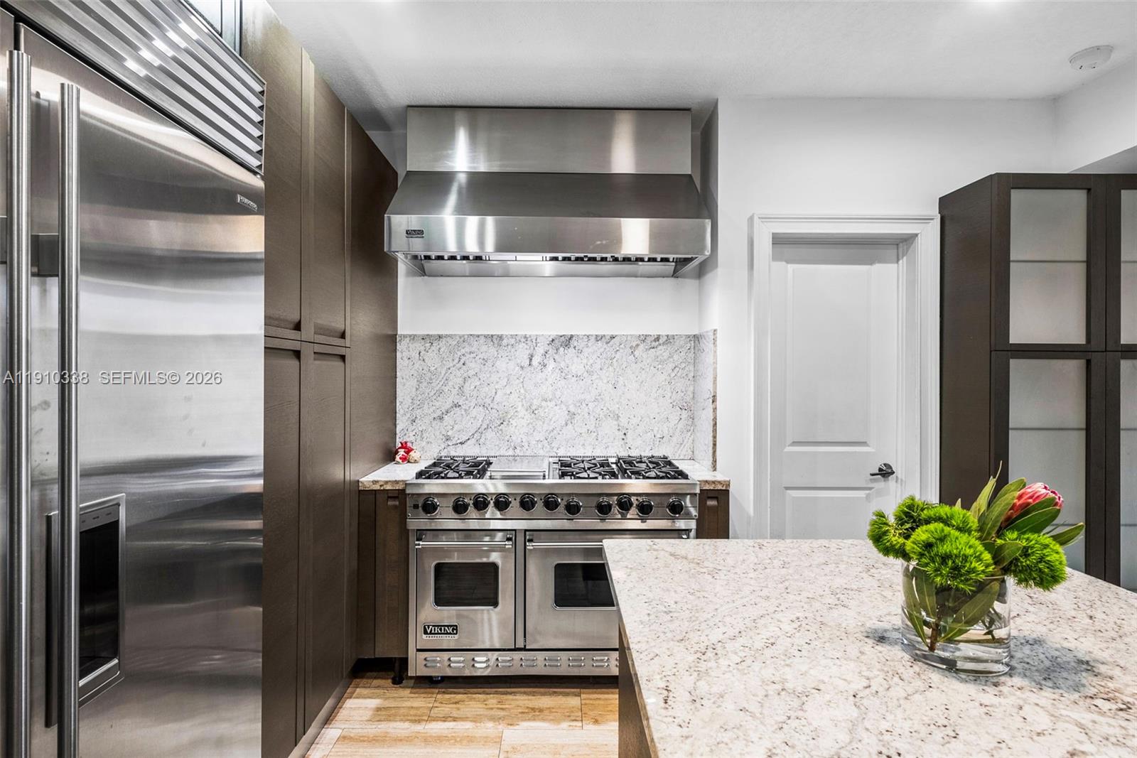 6300 Allison Road Miami Beach, FL 33141 - Photo 22 of 43 a kitchen with a stove and a refrigerator