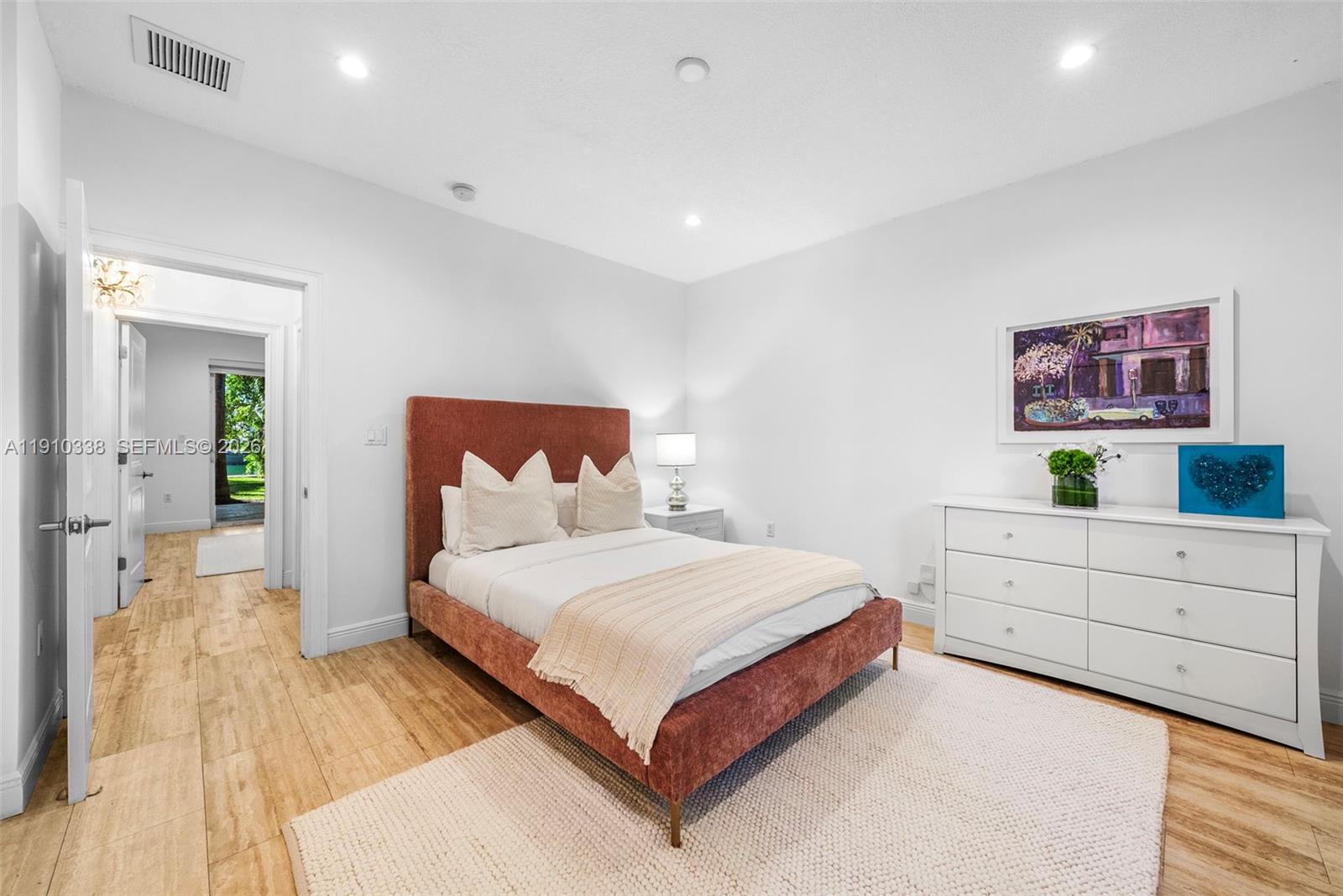 6300 Allison Road Miami Beach, FL 33141 - Photo 31 of 43 a bedroom with a bed and a desk