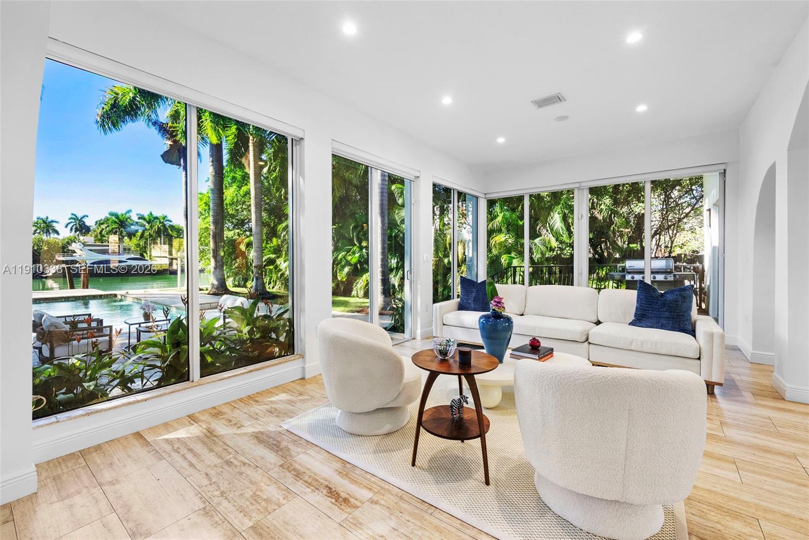 6300 Allison Road Miami Beach, FL 33141 - Photo 10 of 43 a living room with furniture and a large window