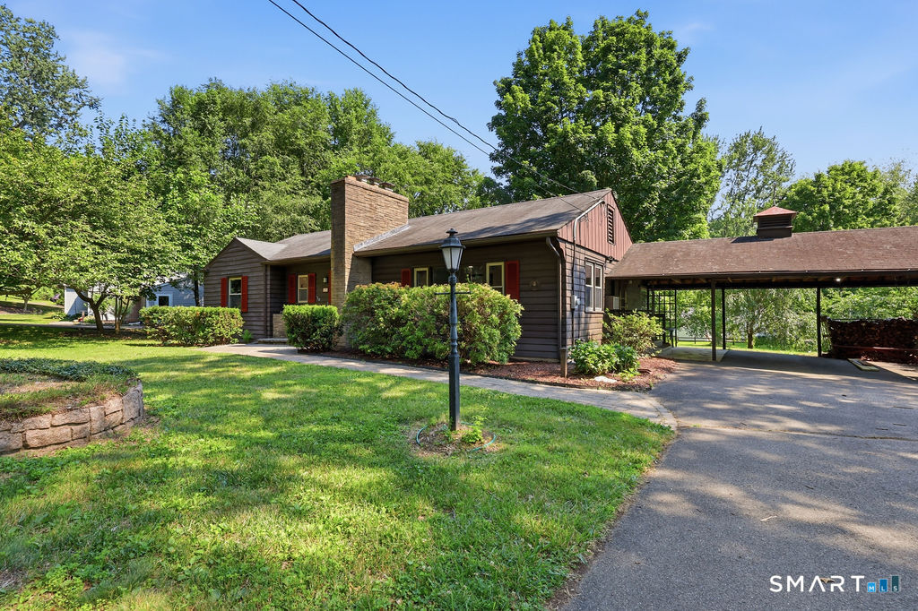 630 South Elm Street Wallingford, CT 06492 - Photo 26 of 30 a house view with a garden space