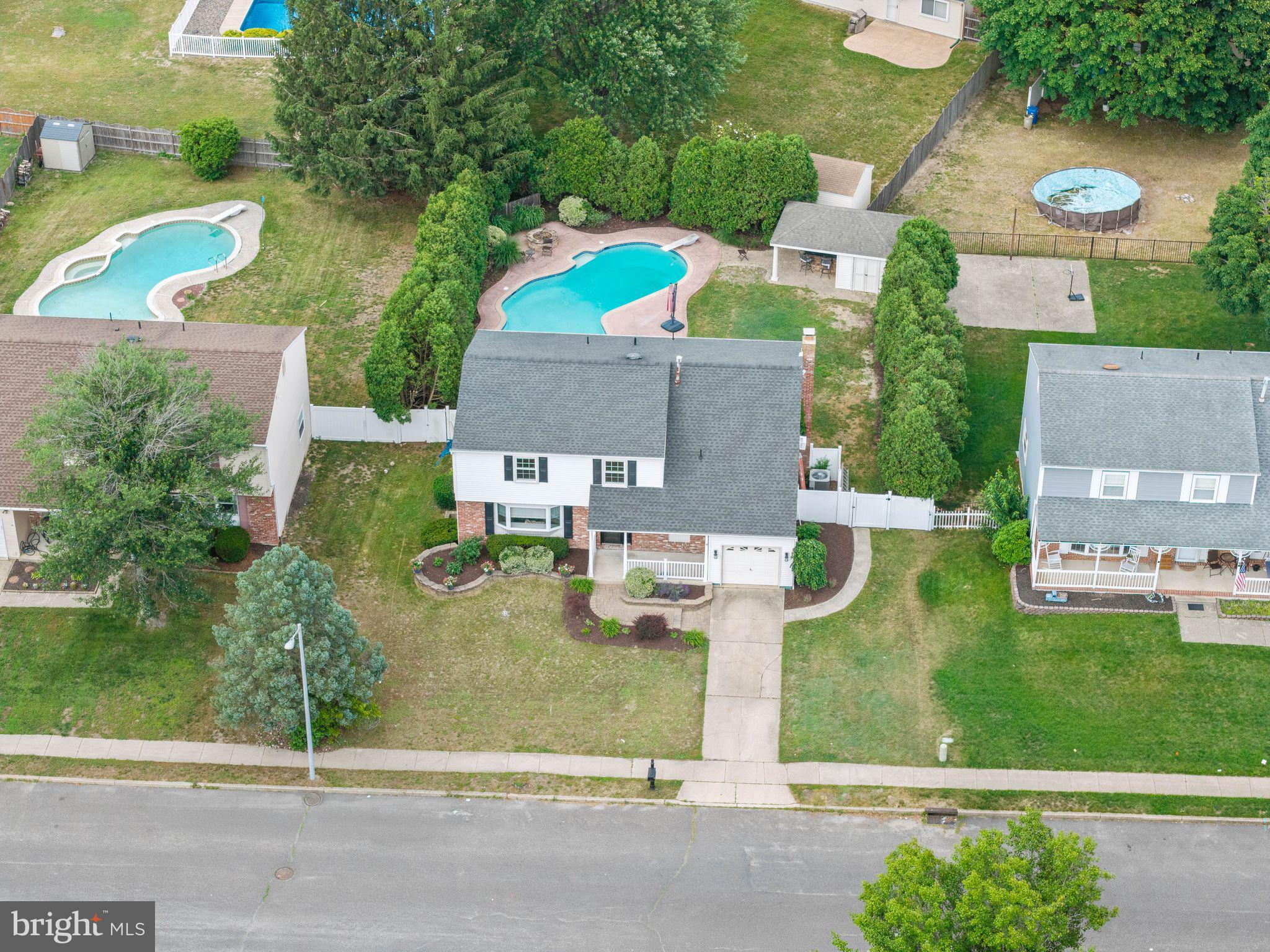 8 Chesterfield Road Sewell, NJ 08080 - Photo 49 of 57 an aerial view of residential houses with outdoor space and parking