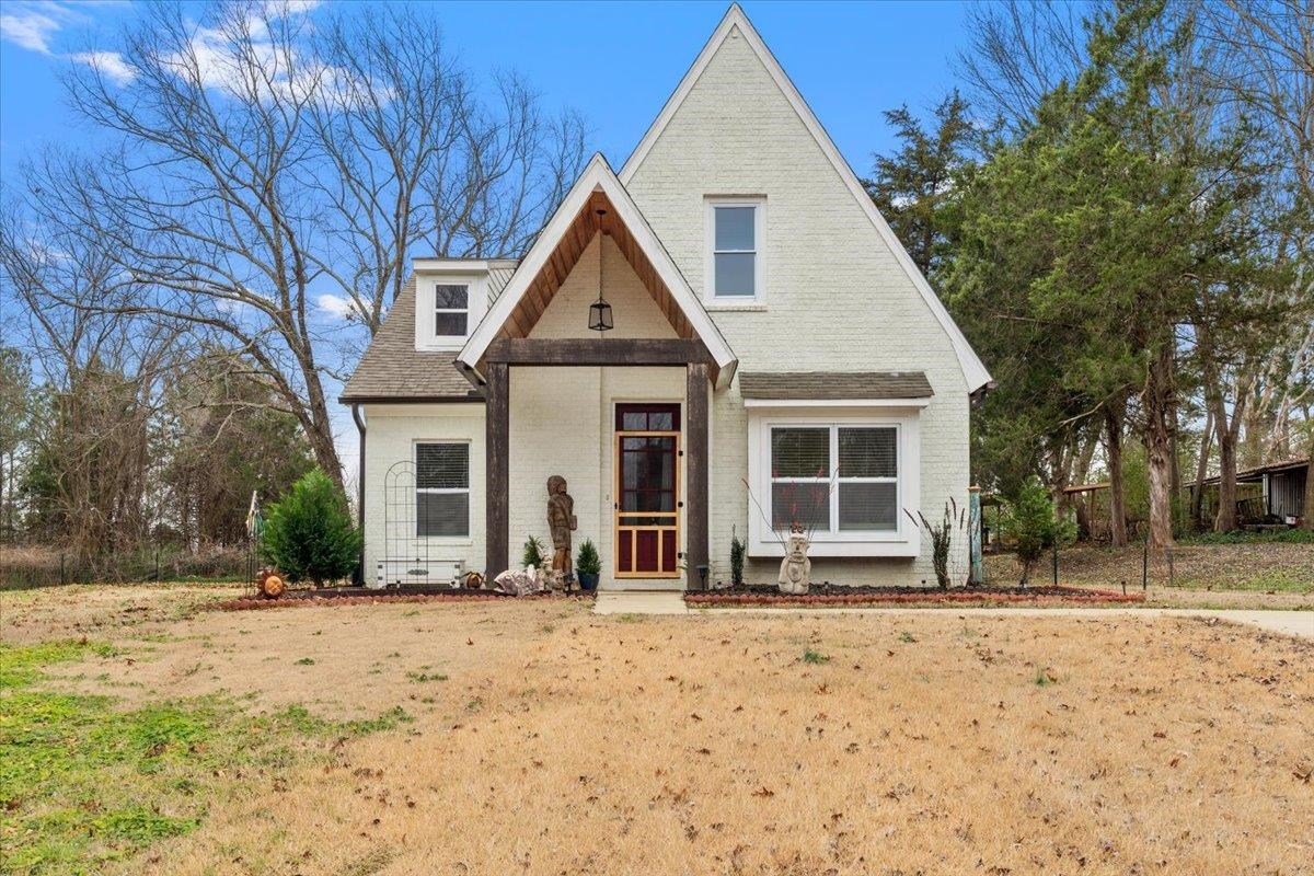 110 Rolling Acres Drive Eads, TN 38028 - Photo 1 of 23 a front view of a house with a yard