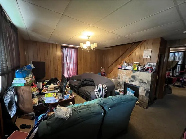 a bathroom with a tub and toilet