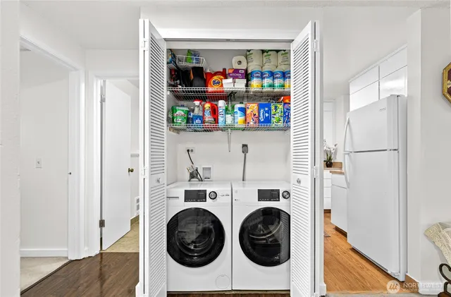 a utility room with dryer and washer