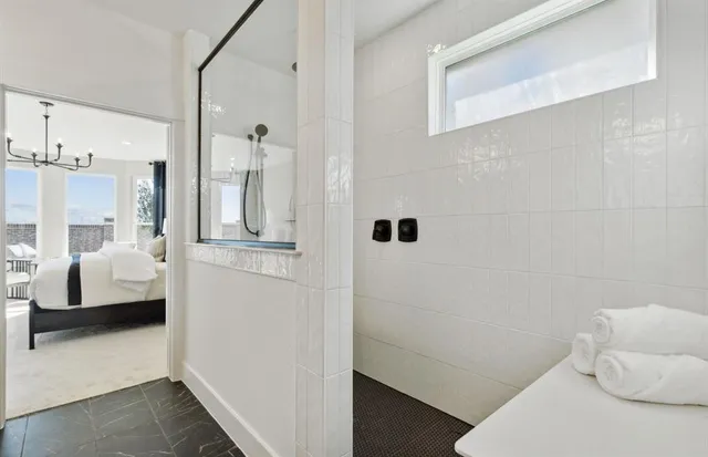 a bathroom with a sink and a shower