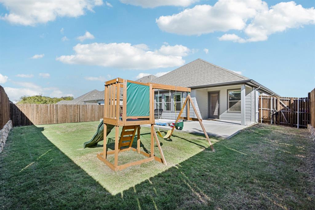 312 Scenic Point Drive Princeton, TX 75407 - Photo 38 of 40 a view of a house with backyard porch and sitting area