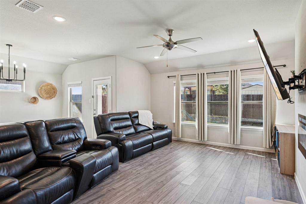 312 Scenic Point Drive Princeton, TX 75407 - Photo 9 of 40 a living room with furniture and a large window