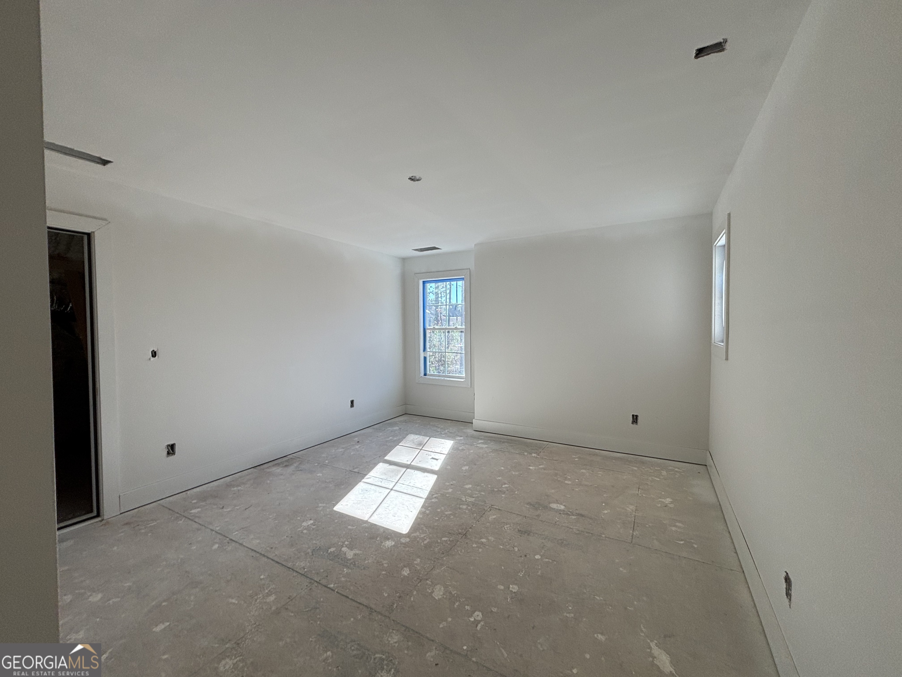 243 Copper Crossing Forsyth, GA 31029 - Photo 17 of 17 a view of an empty room and window