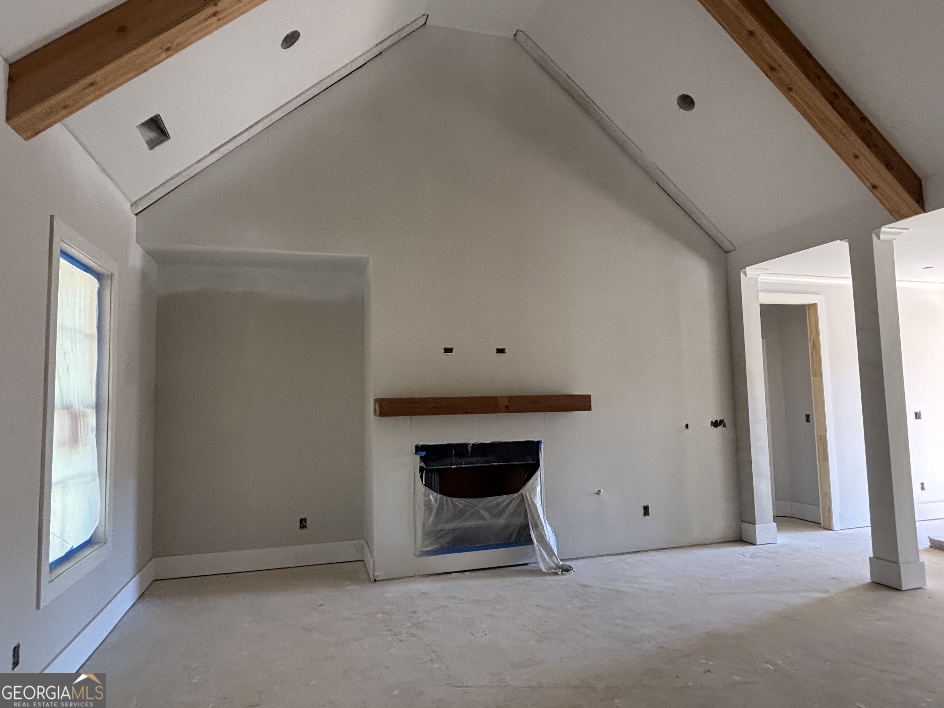243 Copper Crossing Forsyth, GA 31029 - Photo 9 of 17 a view of an empty room with a window