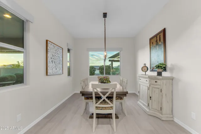 a bedroom with a bed and a chair