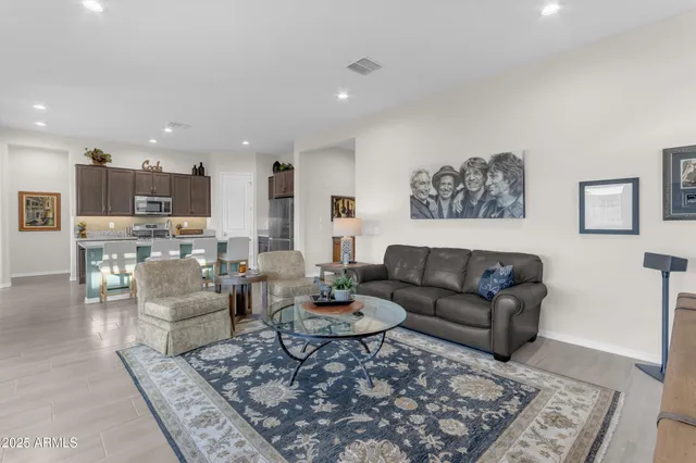 a view of a patio with chairs and table