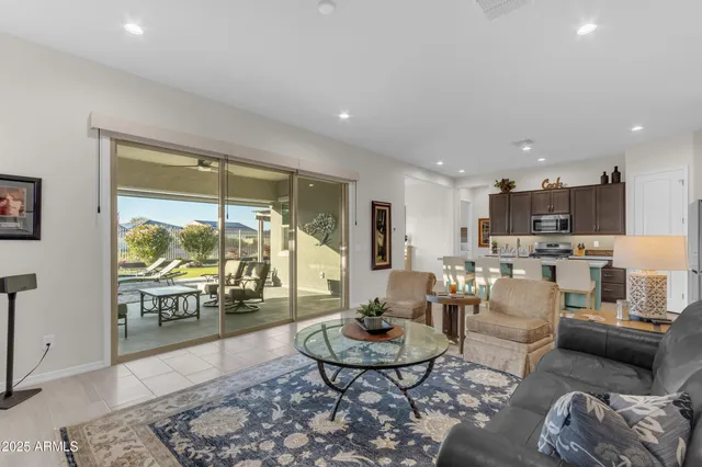 a view of a house with swimming pool yard and patio