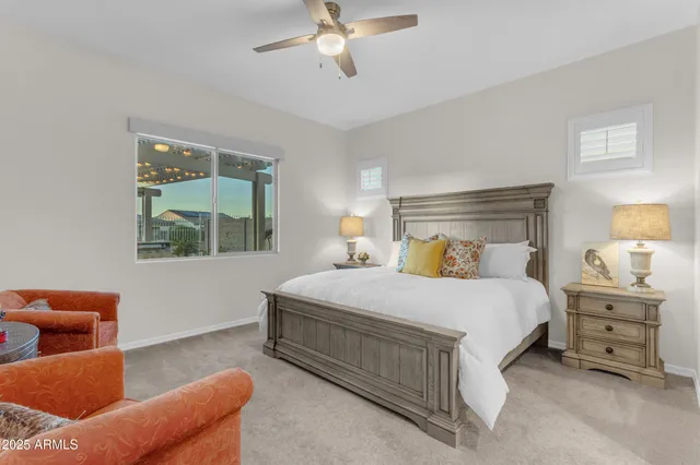 a view of a swimming pool with a lounge chairs