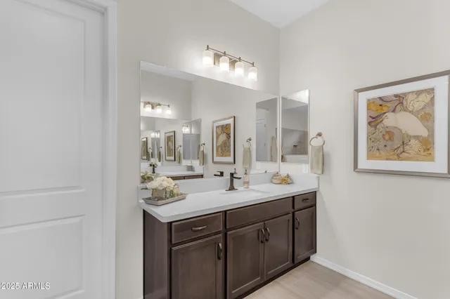 a view of a lake with houses in the back