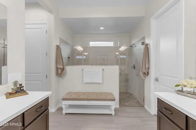 an aerial view of residential houses with outdoor space and parking