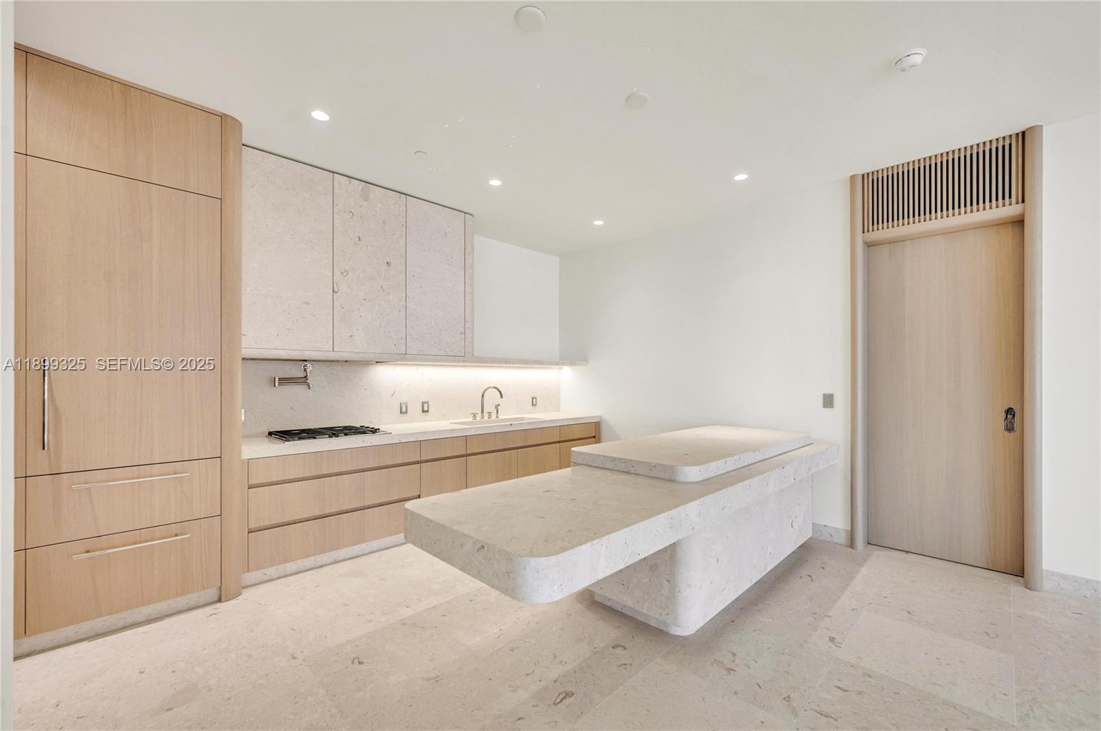 9149 Collins Avenue, Unit 602 Surfside, FL 33154 - Photo 5 of 8 a room with a bed and a cabinets